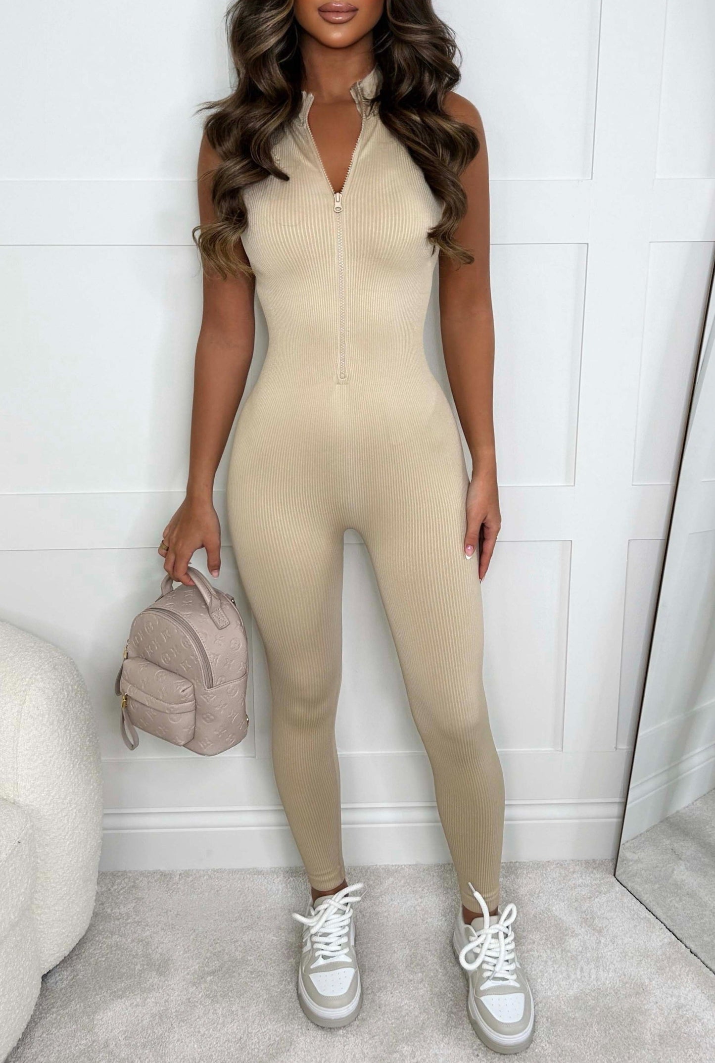 In Her Element Beige Sleeveless Waist Cinching Zip Up Unitard