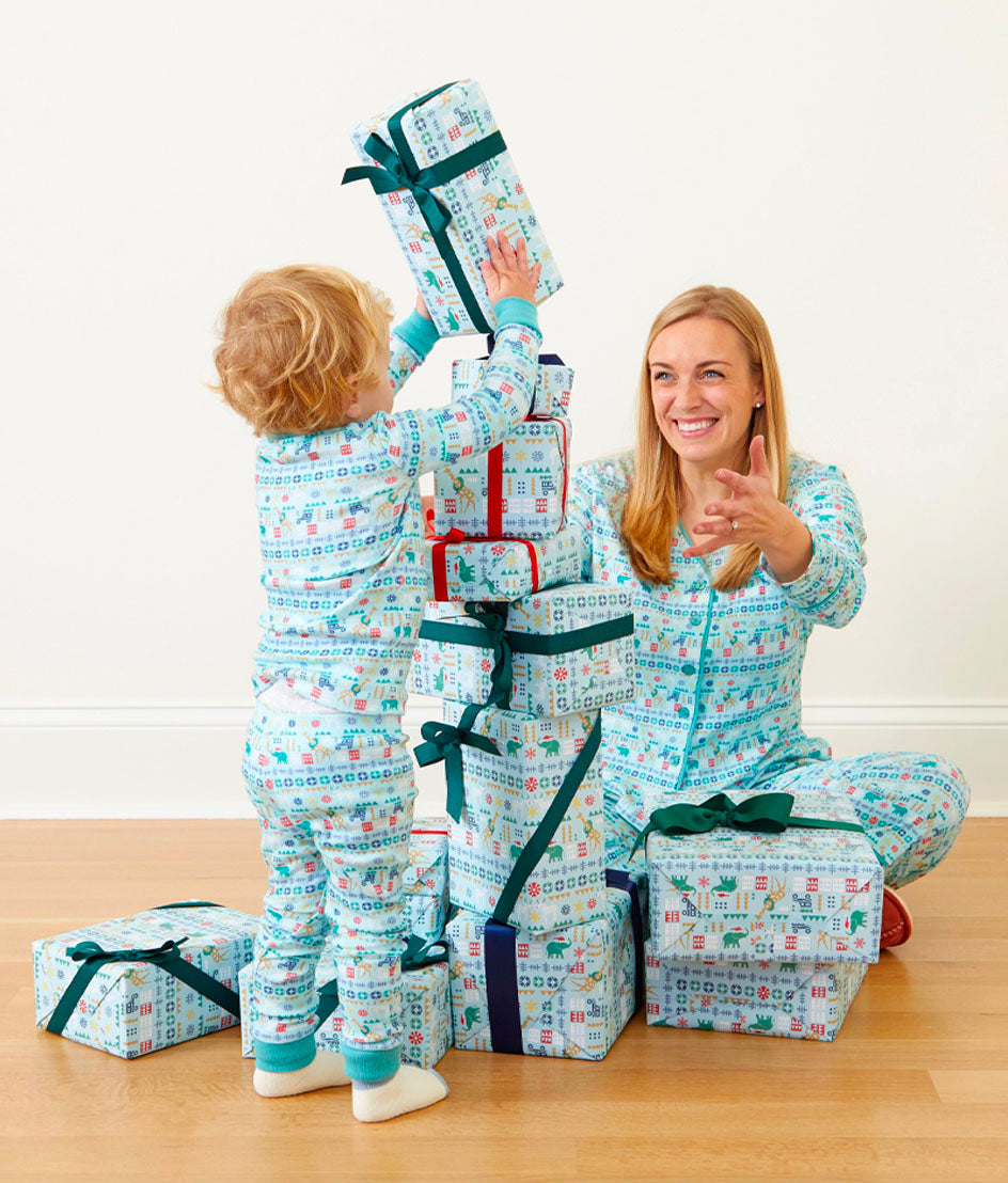 Model in Pajamas, The Kids' Cotton Matching Family Pajama Set - Holidays in the Wild